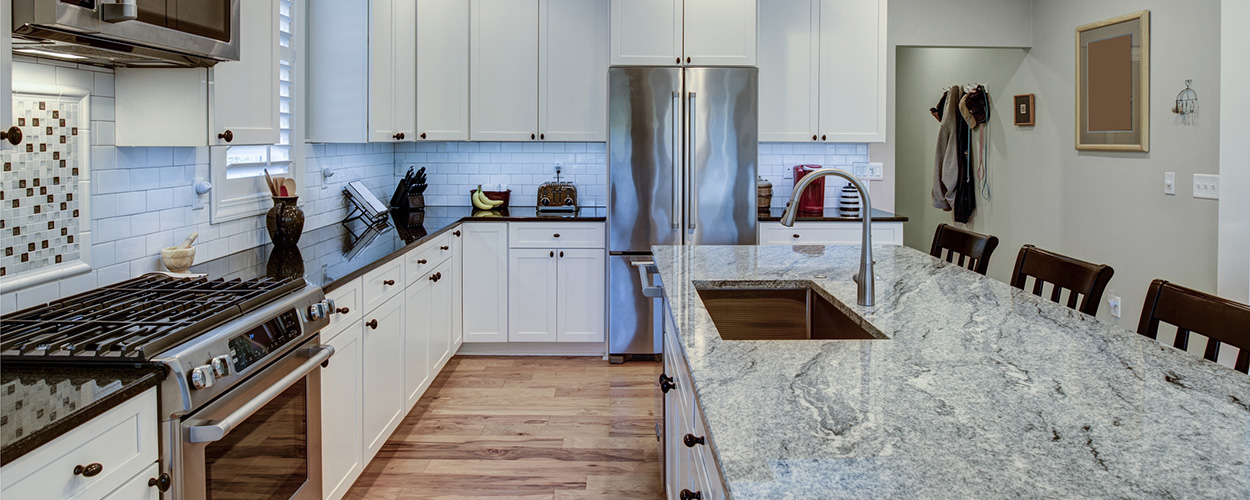 kitchen with quartz and granite countertops